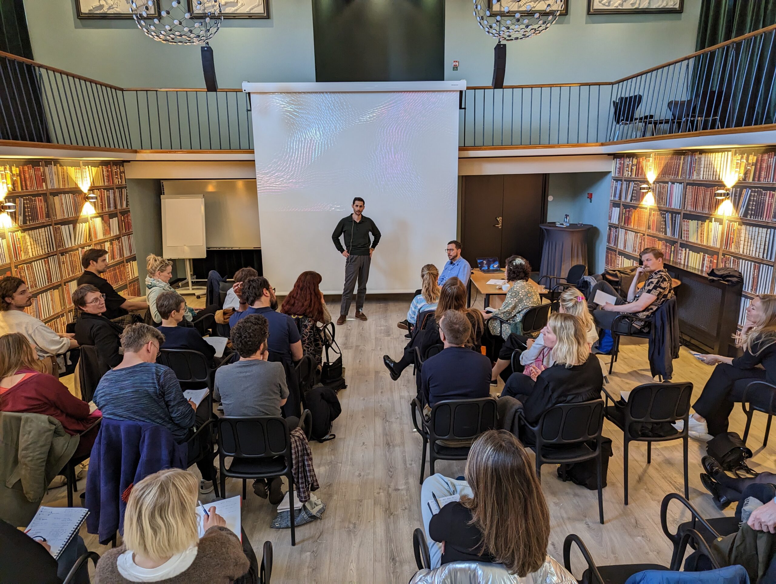 Jonathan Entis on stage in Malmö during the first Managing Resistance conference in 2023